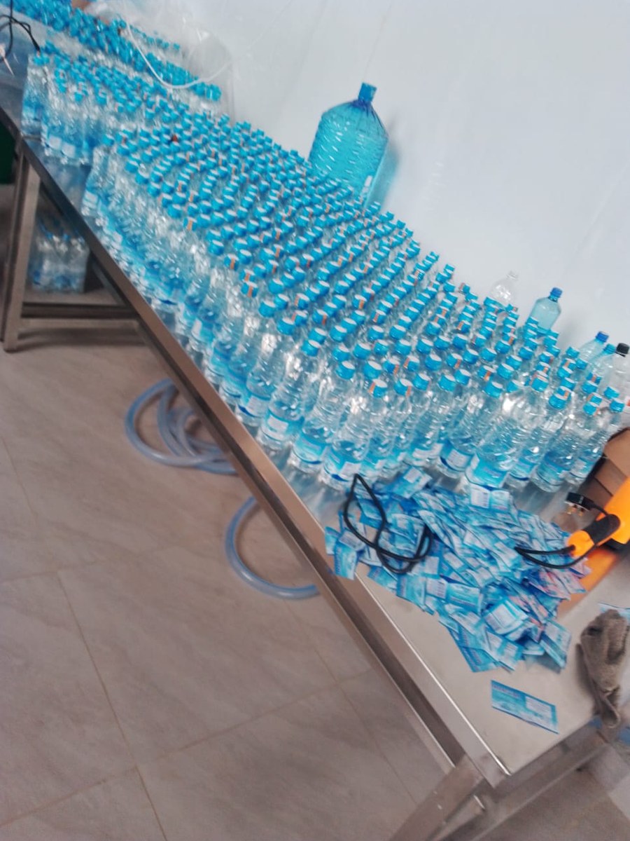 Bottles being filled and sealed on the Mamstar production line